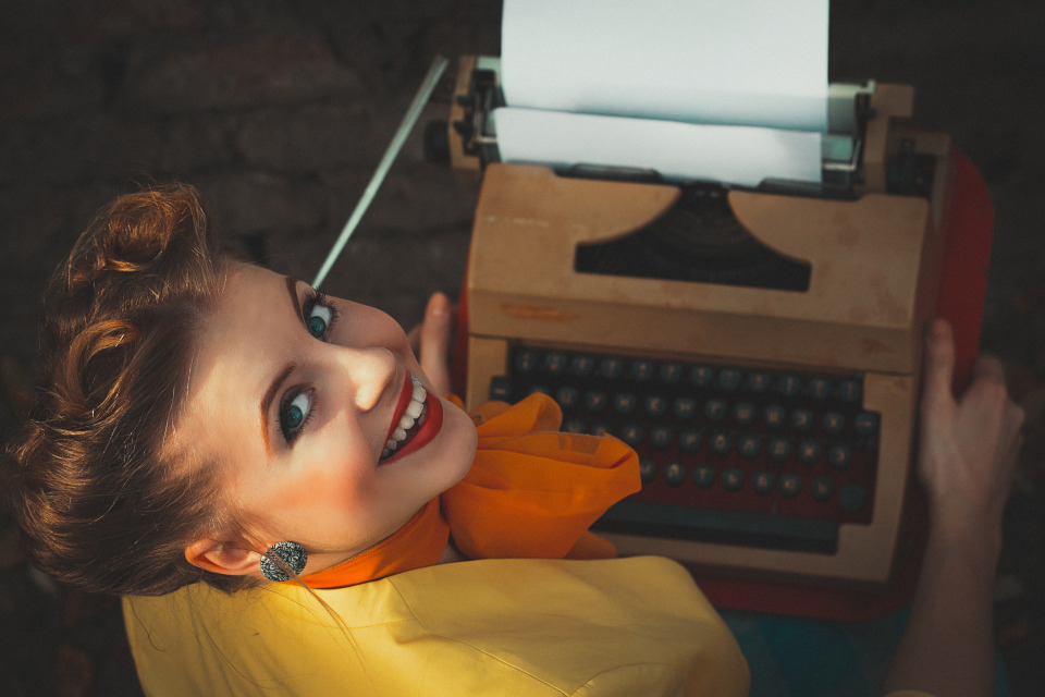 Girl With A Vintage Typewriter Portrait Photos